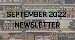 September 2022 newsletter title over an image of a well-stocked grocery shelf.