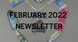 February 2022 newsletter poster with some products on table