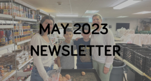 Three individuals posing inside a pantry with shelves stocked with food items, overlaid with text "may 2023 newsletter".